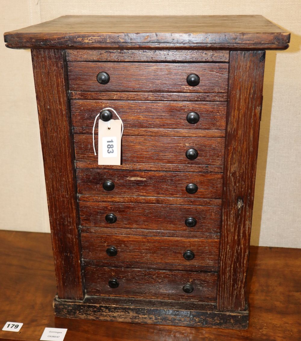 An oak miniature Wellington chest, W.39cm, D.31cm, H.51cm